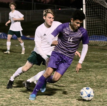 Lemoore's Pablo Gomez controls the ball Tuesday night in the Tigers' first-round playoff game against Templeton.